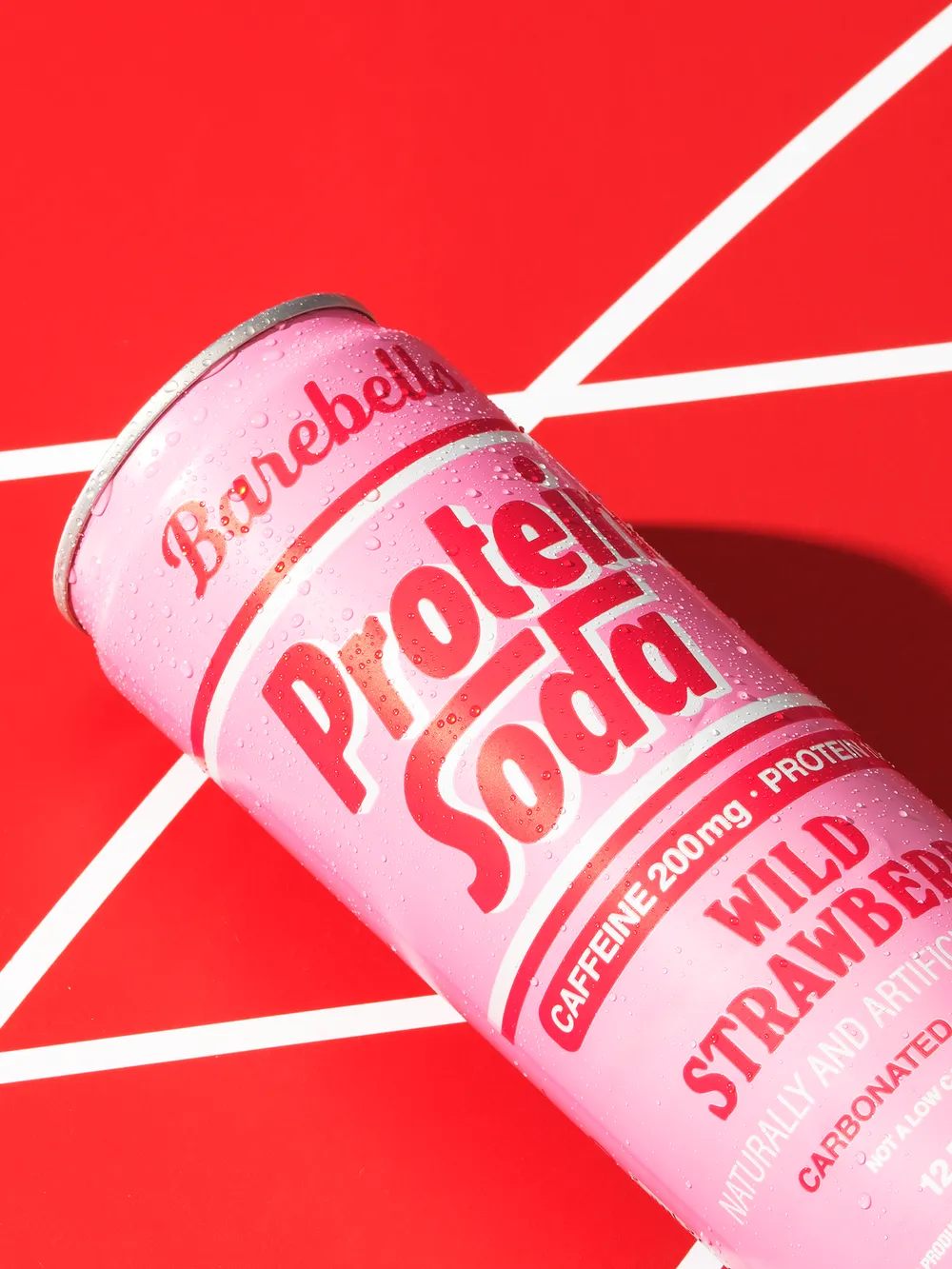 Barebells Protein Soda Wild Strawberry can at an angle