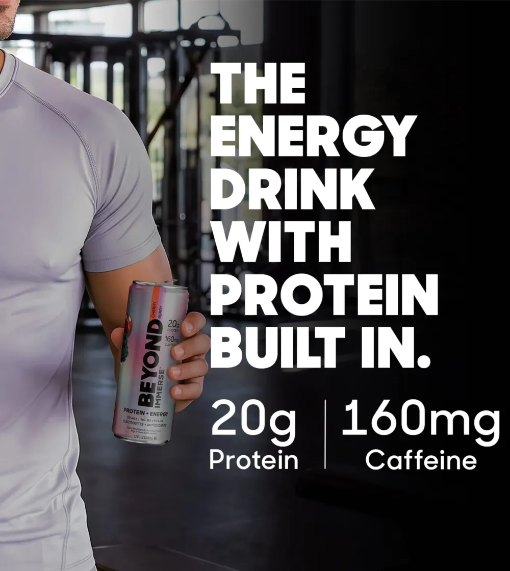 A cropped gym lifestyle image shows a person in a light shirt holding a slim silver can with “BEYOND” and “PROTEIN + ENERGY” visibly printed on it