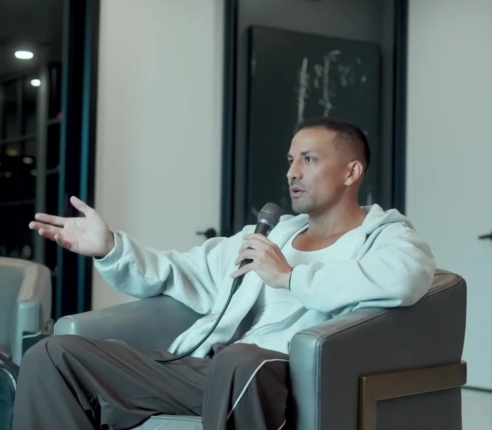 3D Energy founder Christian Guzman speaking into a microphone during Bevlab Podcast Episode #005