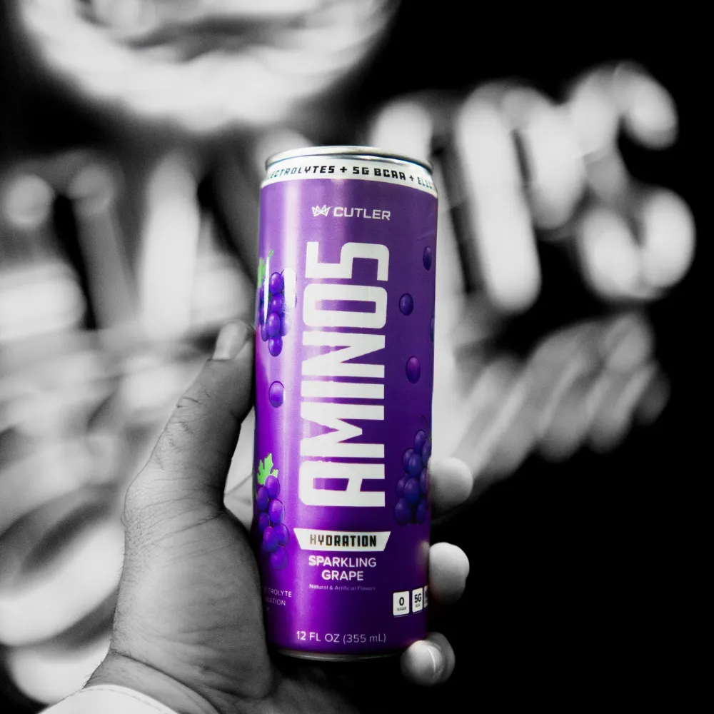 Cutler Amino5 sparkling BCAA can held in hand