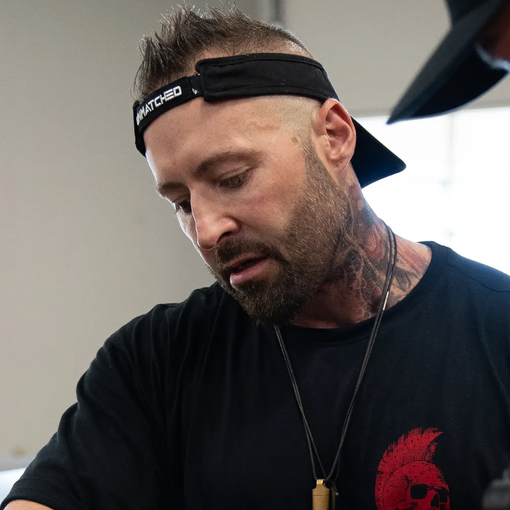 Kris Gethin in Unmatched Supps branded visor
