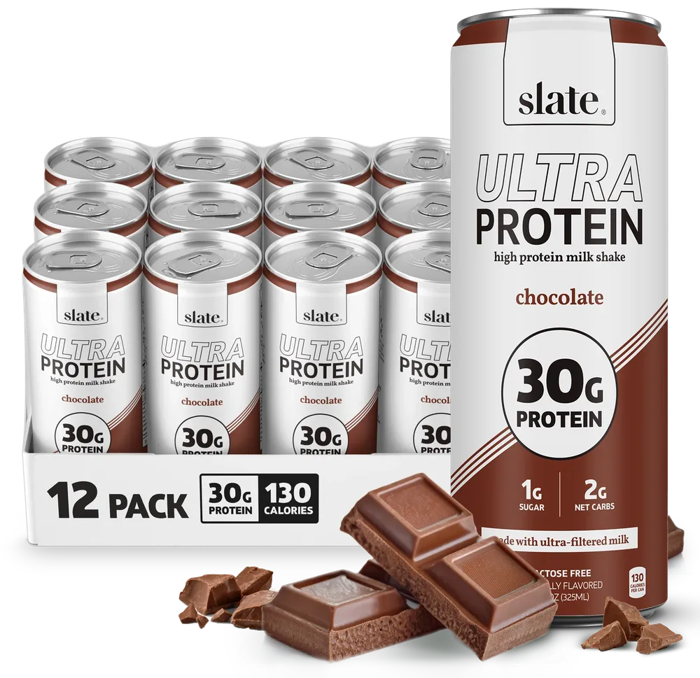 A Slate Ultra Protein high-protein milk shake multipack is shown with white-and-brown cans labeled chocolate, 30g protein, and 1g sugar