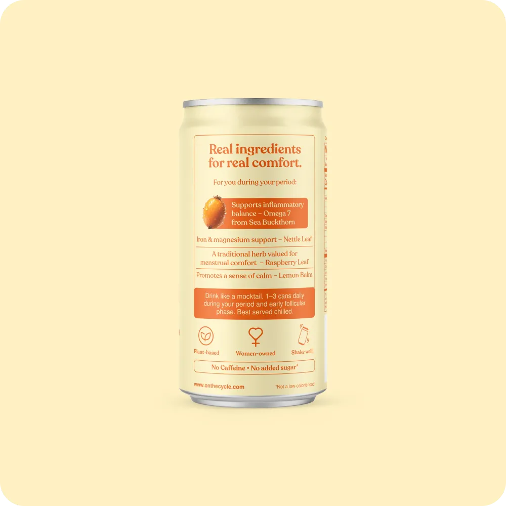 A pale-yellow aluminum can is shown from the back, with an orange-and-cream information panel and small orange icons near the bottom